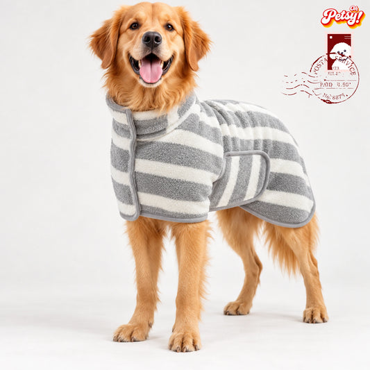 Golden Retriever wearing a white striped dog drying robe with side Velcro fastening. Brand name is OhPetsy.